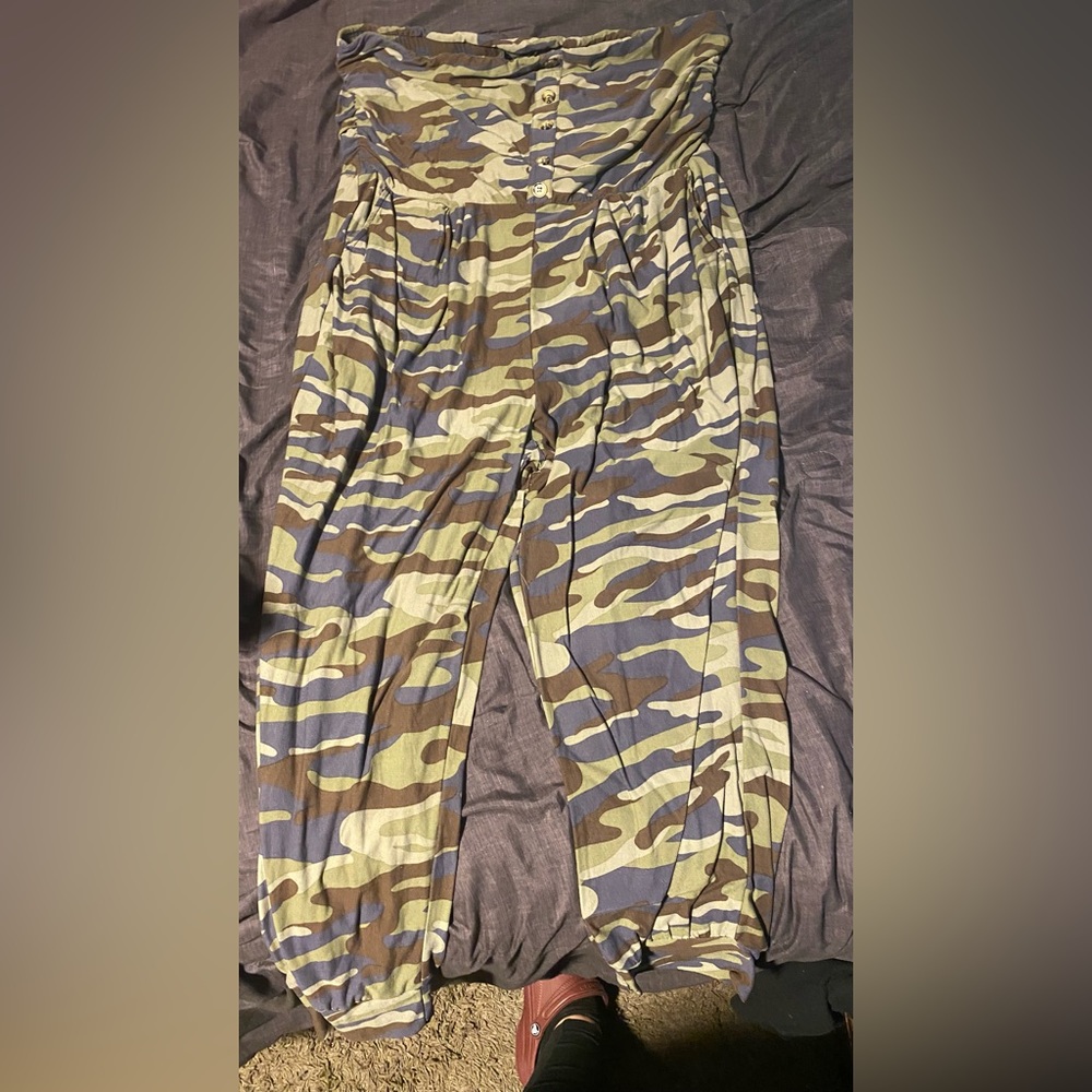 Camouflage jumper, pockets buttons going halfway down in the front